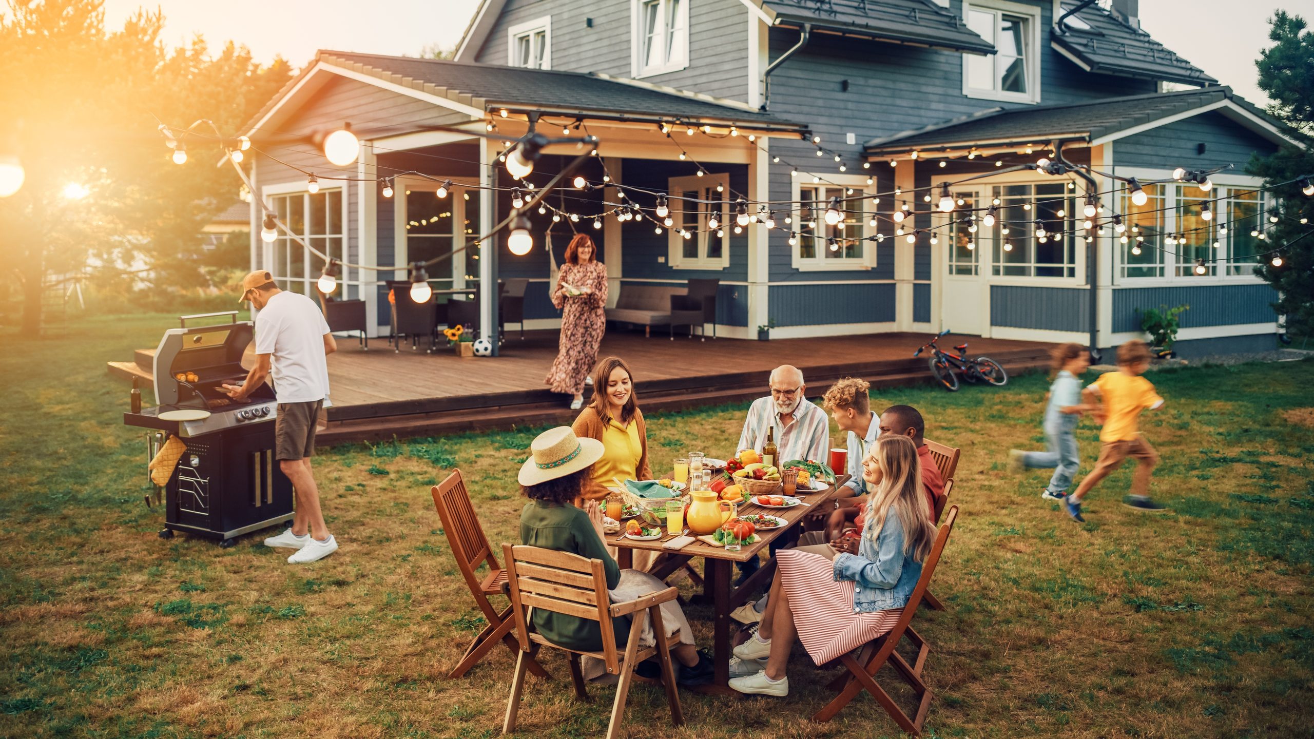 Family gathering on the back porch at sunset